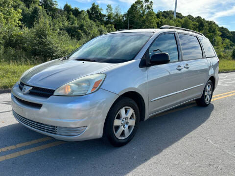 2005 Toyota Sienna for sale at Jim's Hometown Auto Sales LLC in Cambridge OH