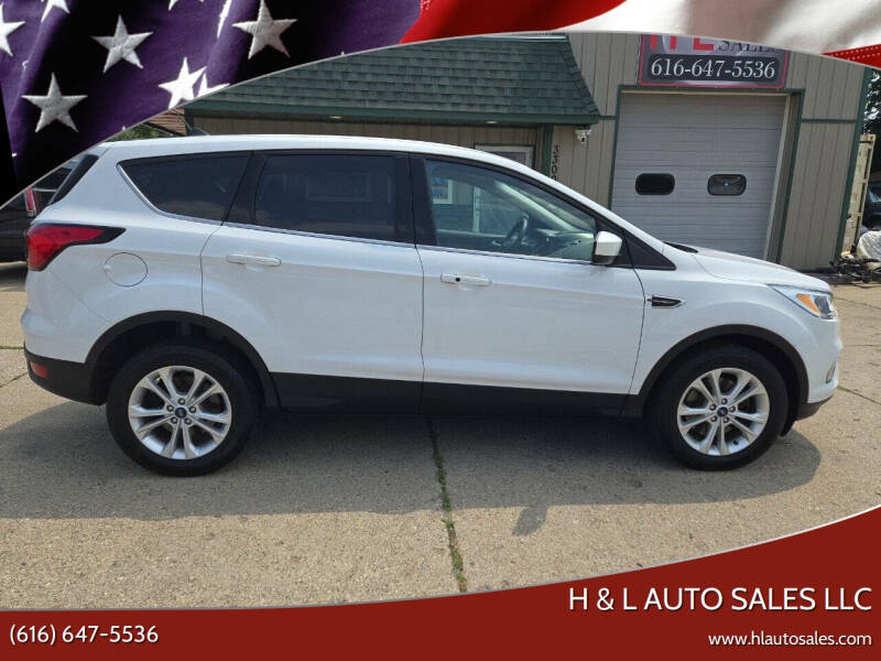 2019 Ford Escape for sale at H & L AUTO SALES LLC in Wyoming MI