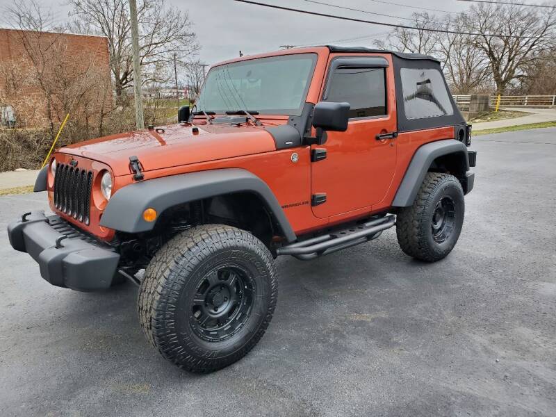2009 Jeep Wrangler for sale at GLASS CITY AUTO CENTER in Lancaster OH