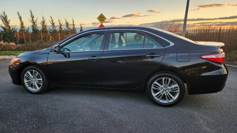 2017 Toyota Camry for sale at ACTION WHOLESALERS in Copiague NY