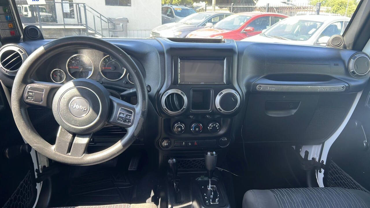 2012 Jeep Wrangler Unlimited for sale at Auto Plaza in Fresno, CA