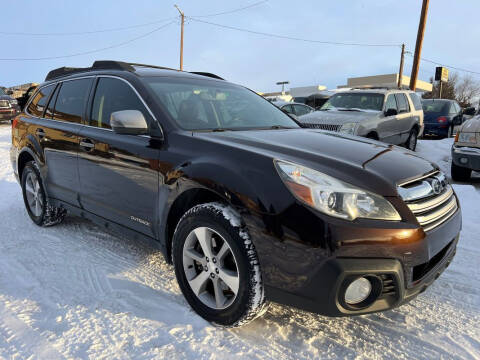 2013 Subaru Outback for sale at BERKENKOTTER MOTORS in Brighton CO