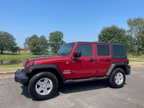 2012 Jeep Wrangler Unlimited for sale at LAMB MOTORS INC in Hamilton AL