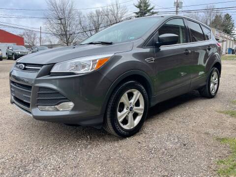 2015 Ford Escape for sale at Jim's Hometown Auto Sales LLC in Byesville OH