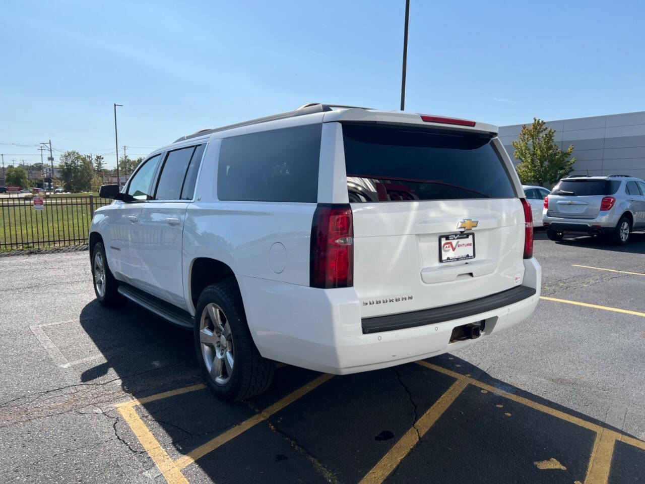 2015 Chevrolet Suburban for sale at Carventure in Lansing, MI