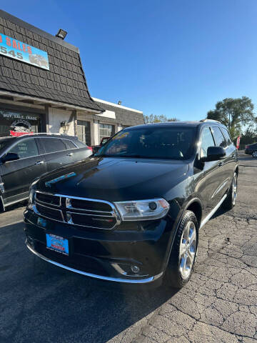 2015 Dodge Durango for sale at VELAZQUEZ AUTO SALES in Aurora IL