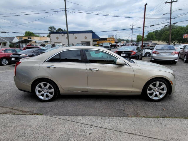 2014 Cadillac ATS for sale at DAGO'S AUTO SALES LLC in Dalton, GA