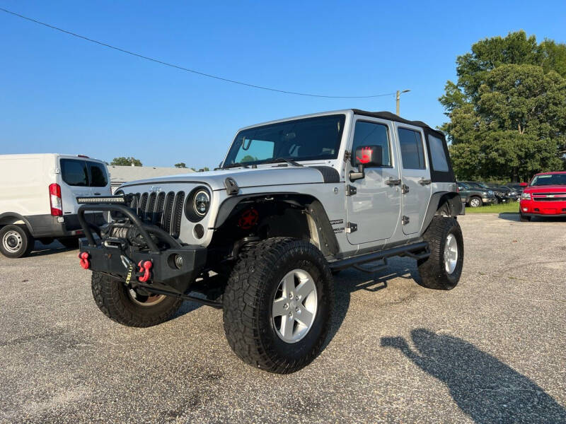 2012 Jeep Wrangler Unlimited for sale at Carworx LLC in Dunn NC