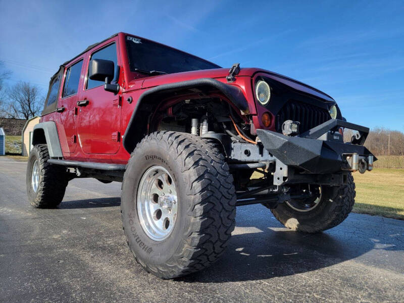 2011 Jeep Wrangler Unlimited for sale at Sinclair Auto Inc. in Pendleton IN