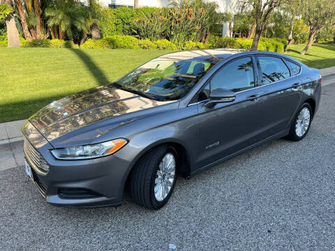 2014 Ford Fusion Hybrid for sale at GM Auto Group in Arleta CA