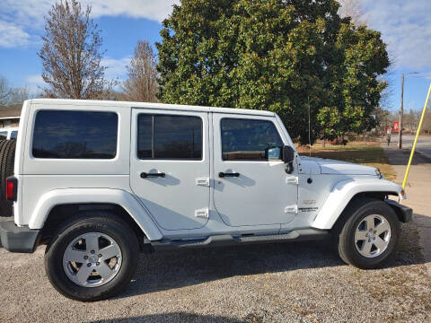 2012 Jeep Wrangler Unlimited for sale at VAUGHN'S USED CARS in Guin AL