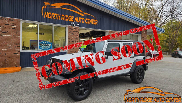 2017 Jeep Wrangler Unlimited for sale at North Ridge Auto Center LLC in Madison, OH