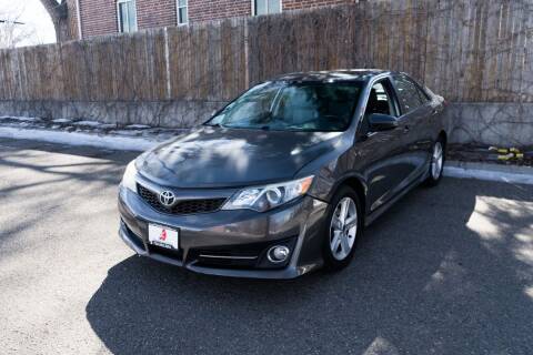 2012 Toyota Camry for sale at Friends Auto Sales in Denver CO