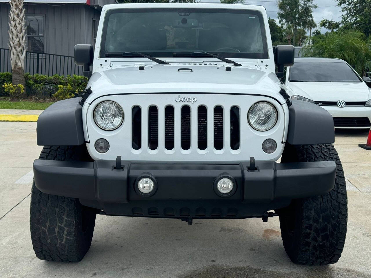 2014 Jeep Wrangler for sale at DJA Autos Center in Orlando, FL