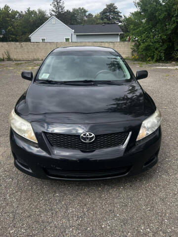 2009 Toyota Corolla for sale at People's Choice Auto Sales in Taylor MI