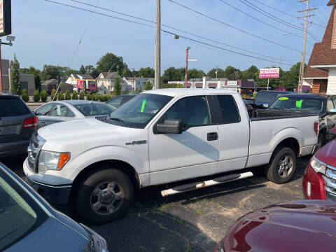 2014 Ford F-150 for sale at Holiday Auto Sales in Grand Rapids MI