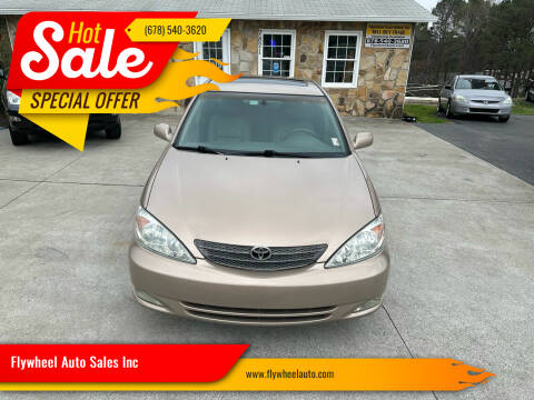 2004 Toyota Camry for sale at Flywheel Auto Sales Inc in Woodstock GA