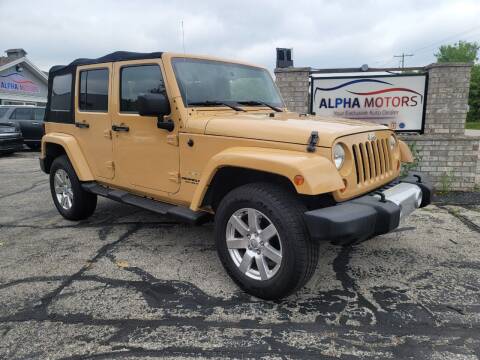 2013 Jeep Wrangler Unlimited for sale at Alpha Motors in New Berlin WI
