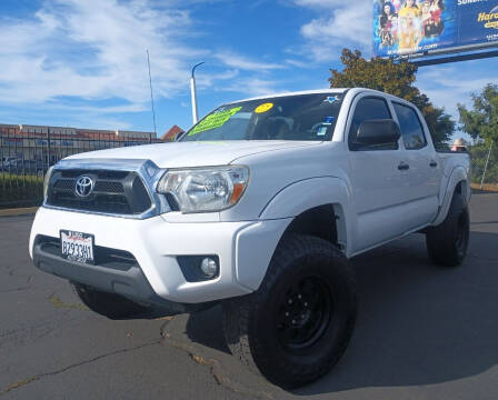 2013 Toyota Tacoma for sale at Lugo Auto Group in Sacramento CA