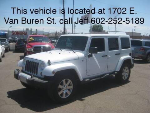 2013 Jeep Wrangler Unlimited for sale at Town and Country Motors - 1702 East Van Buren Street in Phoenix AZ