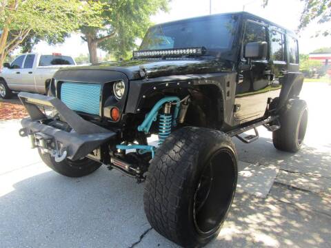 2013 Jeep Wrangler Unlimited for sale at AUTO EXPRESS ENTERPRISES INC in Orlando FL