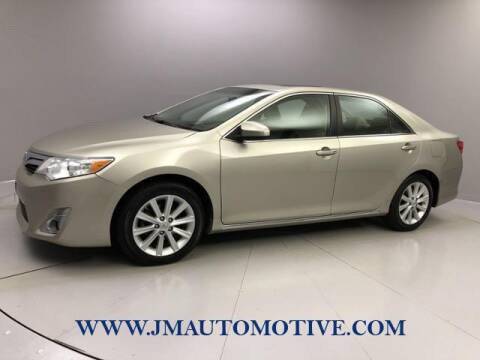 2014 Toyota Camry for sale at J & M Automotive in Naugatuck CT