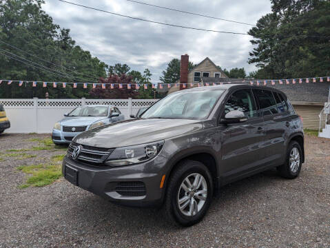 2013 Volkswagen Tiguan for sale at Howe's Auto Sales LLC - Howe's Auto Sales in Lowell MA