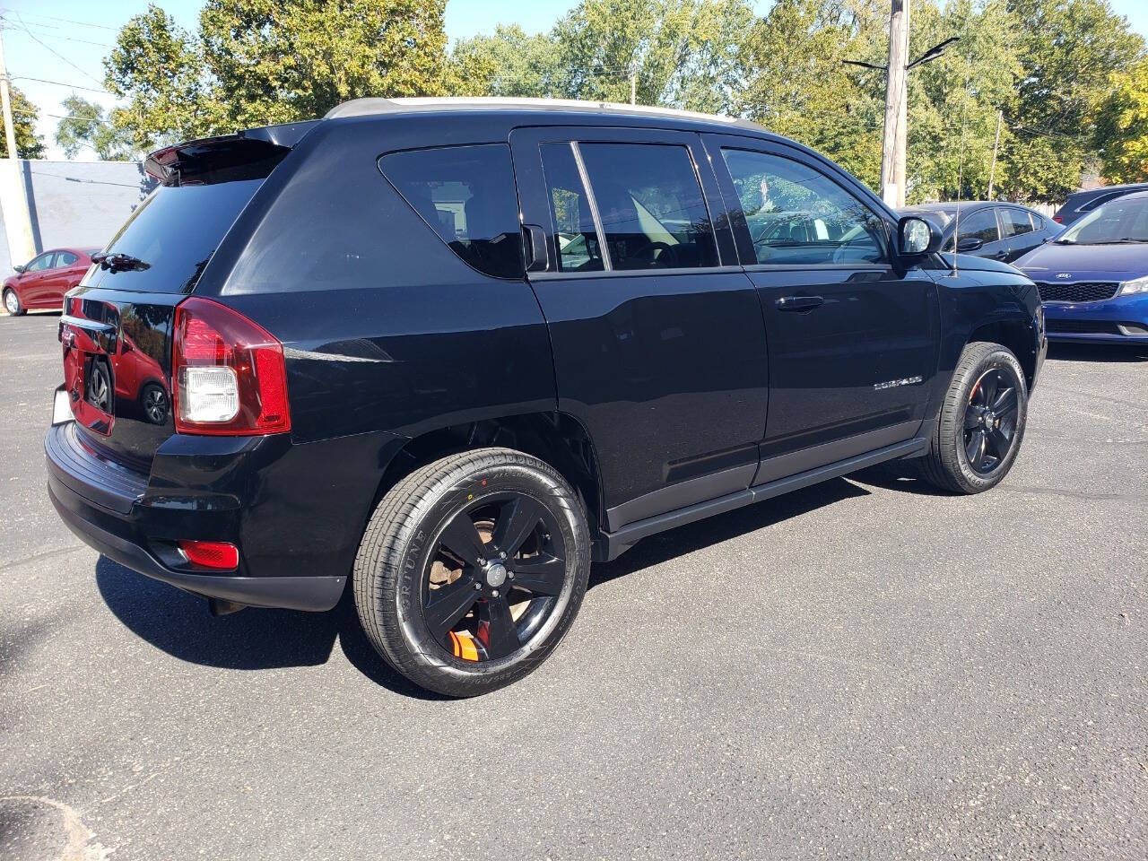 2016 Jeep Compass for sale at Auto Shop in Wyoming, MI