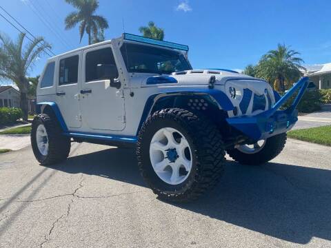 2015 Jeep Wrangler Unlimited for sale at BIG BOY DIESELS in Fort Lauderdale FL