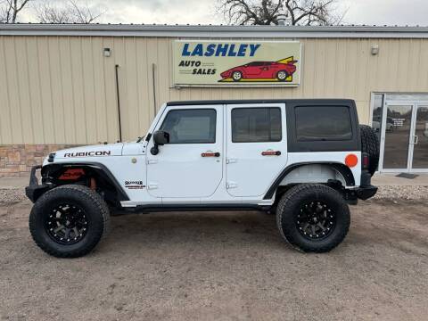 2014 Jeep Wrangler Unlimited for sale at Lashley Auto Sales in Mitchell NE