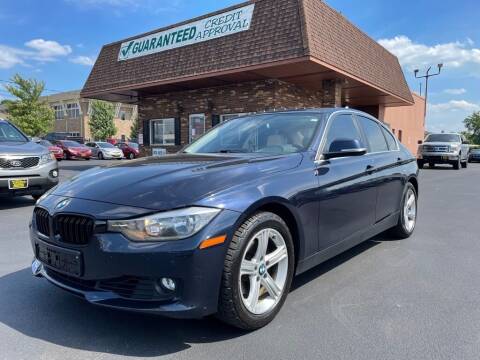 2015 BMW 3 Series for sale at ENZO AUTO in Parma OH