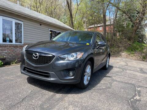 2015 Mazda CX-5 for sale at Rams Auto Sales LLC in South Saint Paul MN