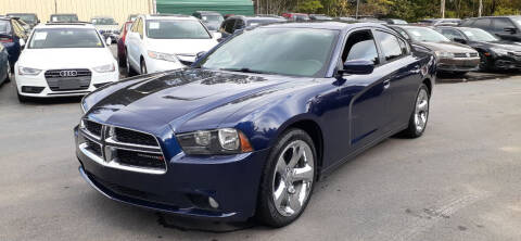 2014 Dodge Charger for sale at GEORGIA AUTO DEALER LLC in Buford GA