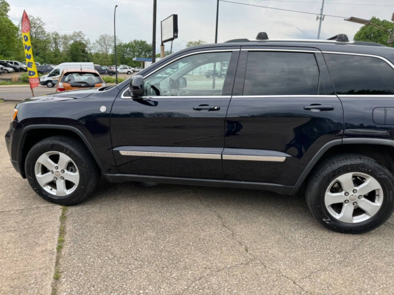 2011 Jeep Grand Cherokee for sale at First Class Auto Mall in Akron, OH