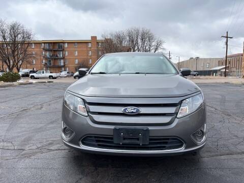 2012 Ford Fusion for sale at AROUND THE WORLD AUTO SALES in Denver CO