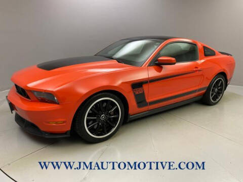 2012 Ford Mustang for sale at J & M Automotive in Naugatuck CT