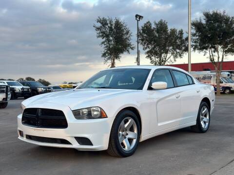 2013 Dodge Charger for sale at Chiefs Auto Group in Hempstead TX