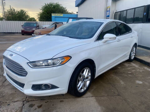 2013 Ford Fusion for sale at Buy-Fast Autos in Houston TX