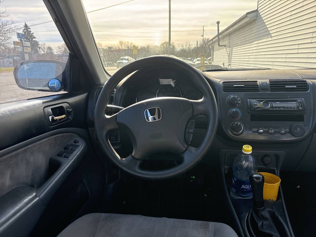 2003 Honda Civic for sale at DECKER AUTO SALES in Bay City, MI