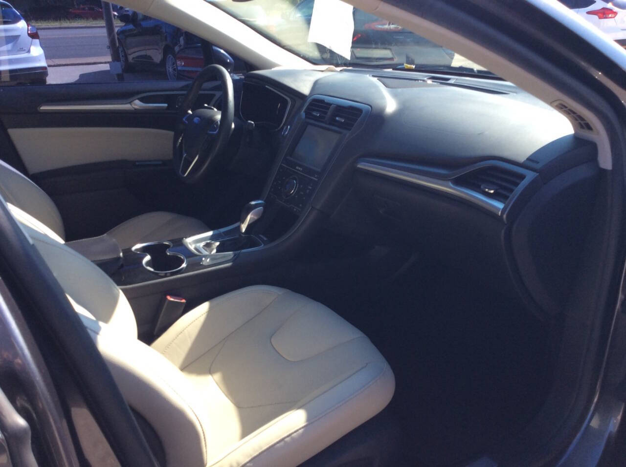 2015 Ford Fusion Hybrid for sale at SPRINGTIME MOTORS in Huntsville, TX