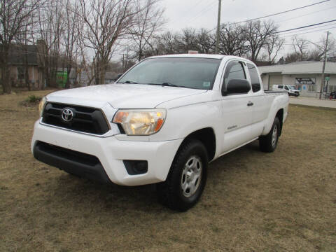 2014 Toyota Tacoma for sale at Triangle Auto Sales in Elgin IL