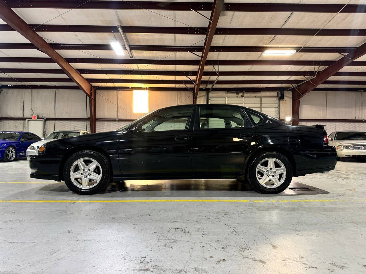 2004 Chevrolet Impala for sale at Carnival Car Company in Victoria, TX