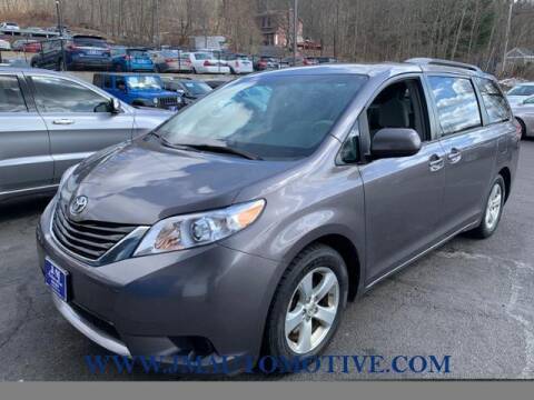 2014 Toyota Sienna for sale at J & M Automotive in Naugatuck CT