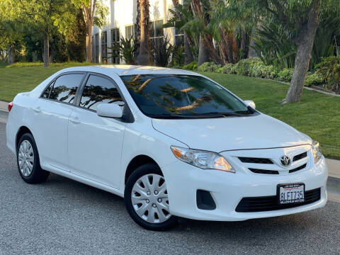 2012 Toyota Corolla for sale at MILLENNIUM MOTORS in Van Nuys CA