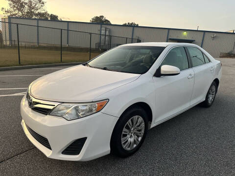 2013 Toyota Camry for sale at Phoenix Motor Sales in Snellville GA