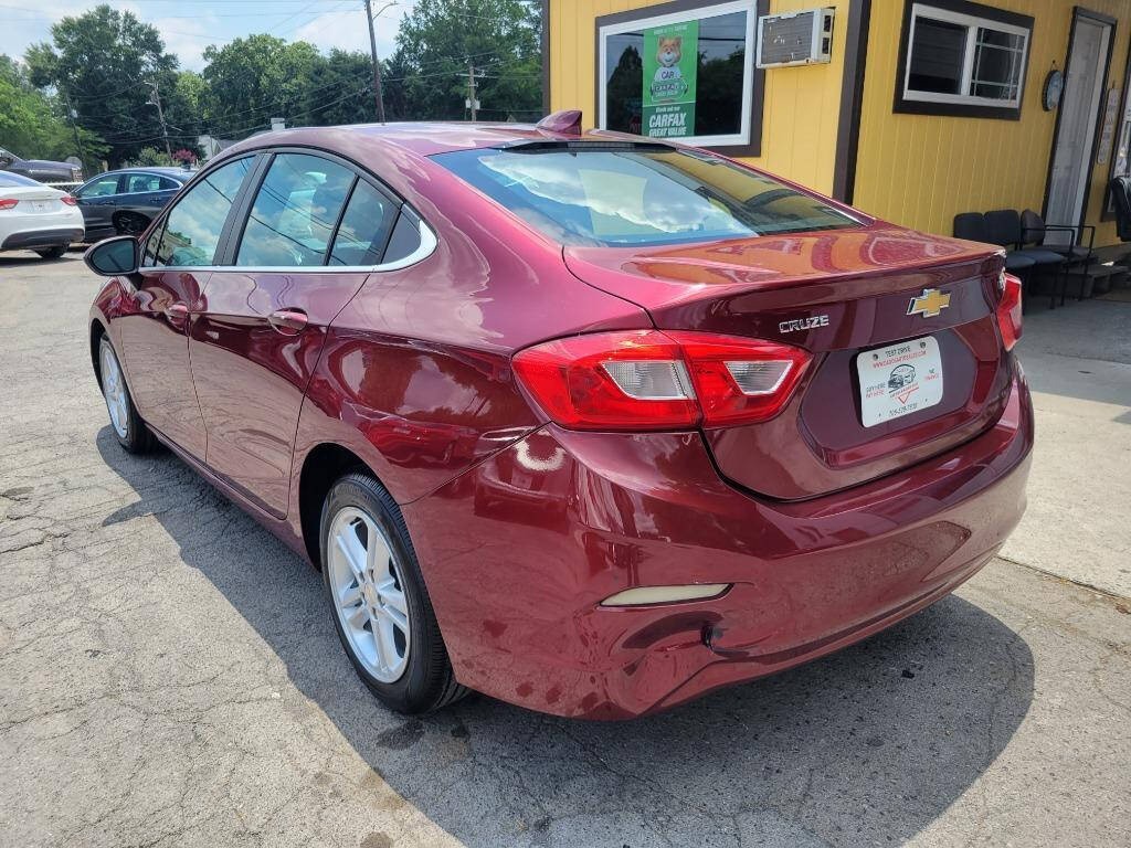 2016 Chevrolet Cruze for sale at DAGO'S AUTO SALES LLC in Dalton, GA