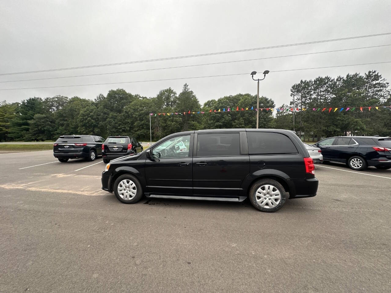 2016 Dodge Grand Caravan for sale at Auto Hunter in Webster, WI