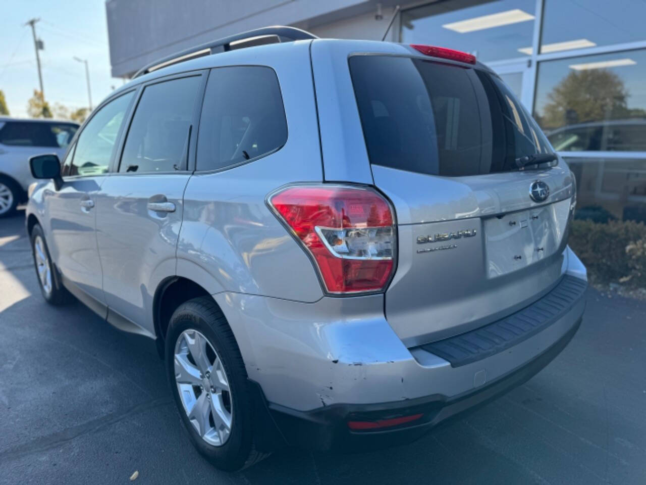 2015 Subaru Forester for sale at Opus Motorcars in Utica, MI