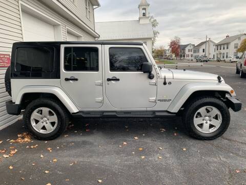 2012 Jeep Wrangler Unlimited for sale at VILLAGE SERVICE CENTER in Penns Creek PA