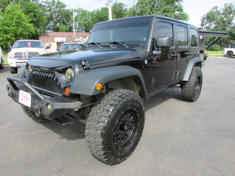 2012 Jeep Wrangler Unlimited for sale at Roddy Motors in Mora MN